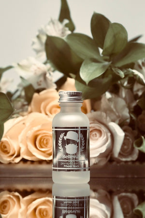 Bellevue Premium Beard Oil by The Beard Baron pictured on a mirror with roses